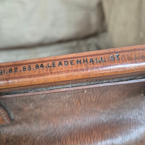 92 - A large Antique leather Gladstone travel bag, with hinged folding sides and leather straps, by John ... 