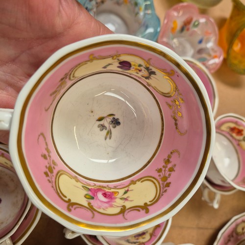 1018 - A Victorian porcelain teapot, sucrier and jug, and 17 cups, 11 saucers, 2 plates and slop bowl