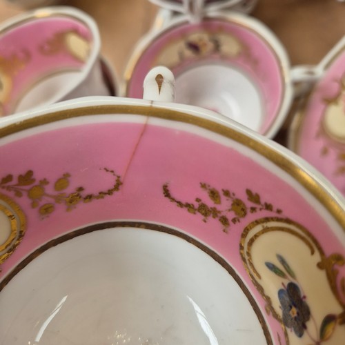 1018 - A Victorian porcelain teapot, sucrier and jug, and 17 cups, 11 saucers, 2 plates and slop bowl