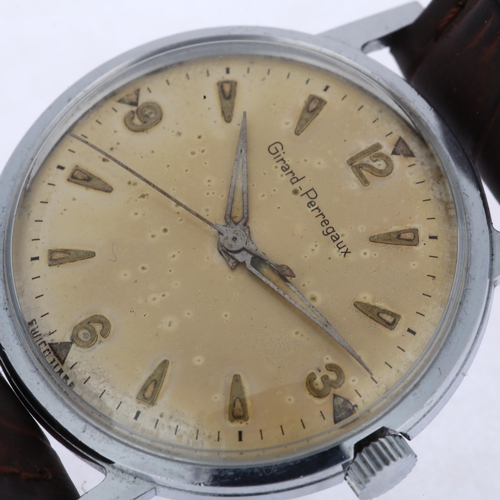 1049 - GIRARD-PERREGAUX - a stainless steel mechanical wristwatch, circa 1970s, silvered dial with applied ... 