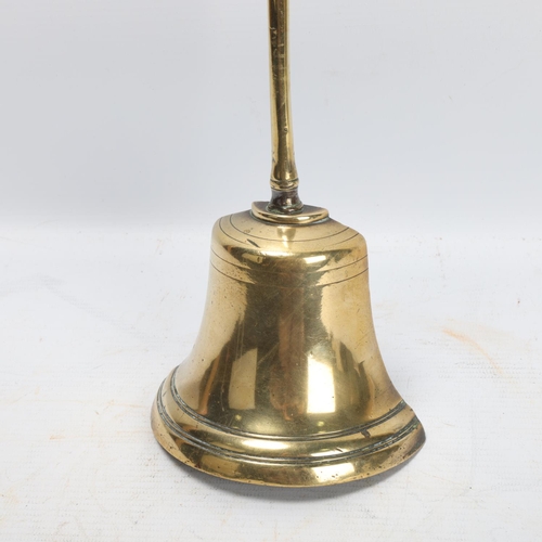 251 - A tall Victorian brass doorstop, height 69cm