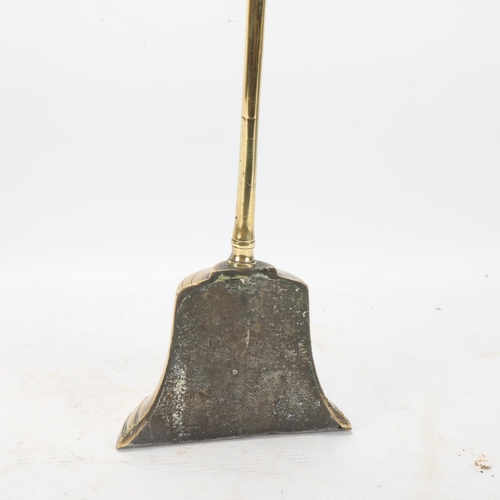 251 - A tall Victorian brass doorstop, height 69cm