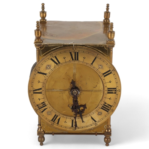 255 - A brass lantern clock, 8-day chain driven single fusee movement, height 21cm, with pendulum