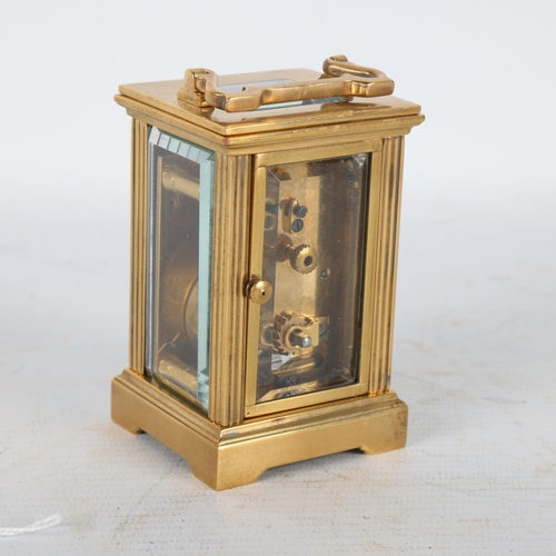 257 - Miniature French brass-cased carriage clock, height 8.5cm