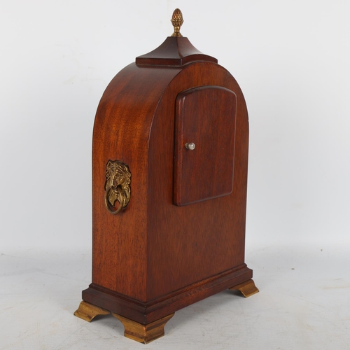 258 - A reproduction mahogany cased dome-top mantel clock, on brass bracket feet, by Comitti of London, he... 