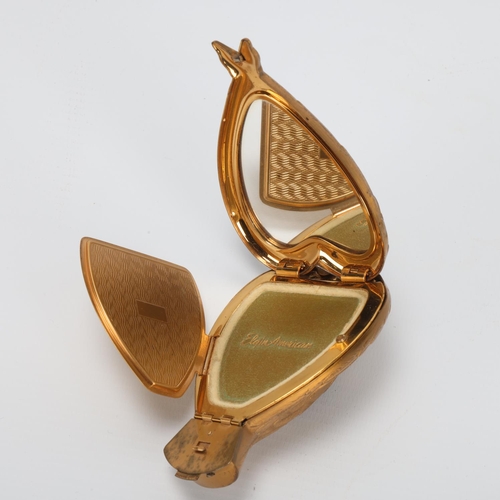 4 - Salvador Dali, Bird In Hand compact, circa 1950, gilt-brass with removeable head for lipstick, flip-... 