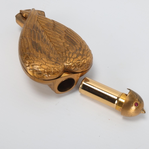 4 - Salvador Dali, Bird In Hand compact, circa 1950, gilt-brass with removeable head for lipstick, flip-... 