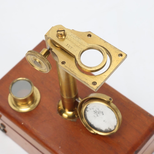 40 - A 19th century brass field microscope, by R Field & Son of Birmingham, no. 147, original mahogany ca... 