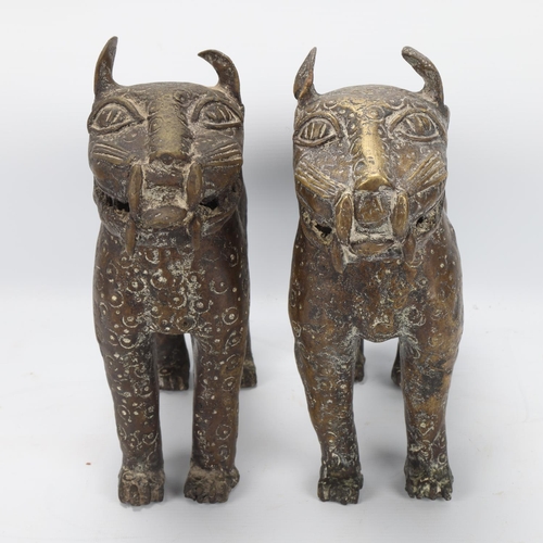 75 - A pair of African bronze leopard figures, probably 19th century, length approx 30cm, height 26cm