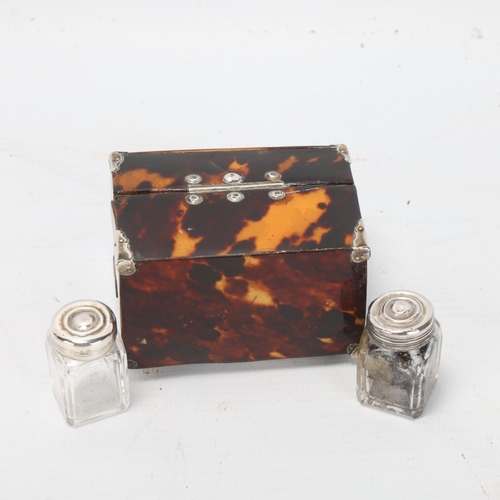 77 - A 19th century tortoiseshell miniature dome-top casket, with unmarked white metal mounts and handle,... 