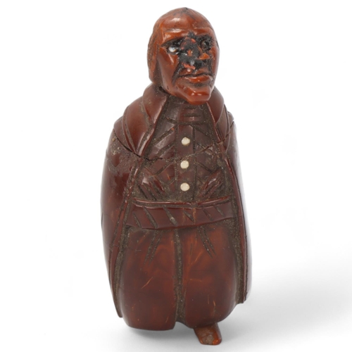 81 - 19th century coquilla nut box in the form of a man, height 7cm