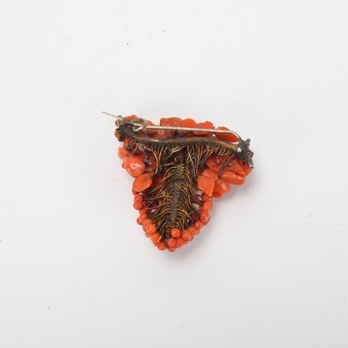 83 - A 19th century coral brooch in the form of a bunch of grapes, height 5cm