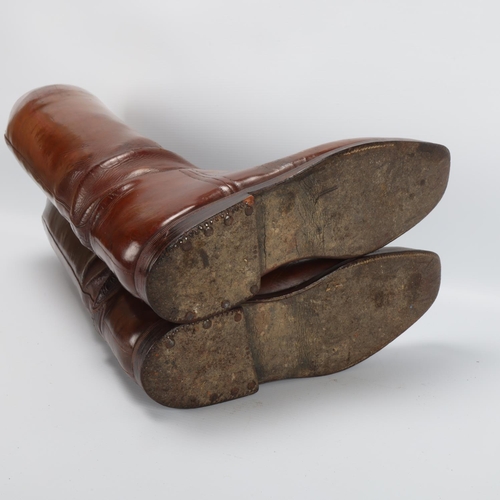 9 - Pair of Victorian brown leather riding boots, with brass-mounted wooden trees