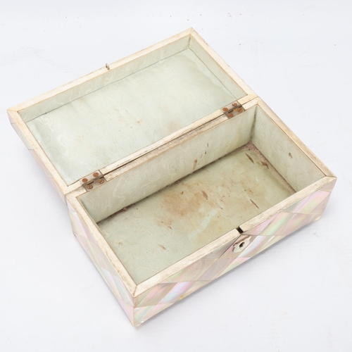 90 - A 19th century mother-of-pearl parquetry covered jewel box, with silk-lined interior, length 17cm