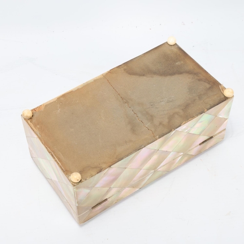 90 - A 19th century mother-of-pearl parquetry covered jewel box, with silk-lined interior, length 17cm