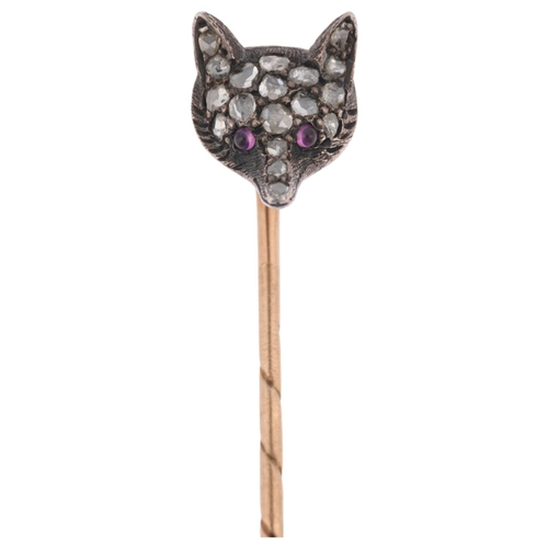 1151 - An Antique ruby and diamond fox-head stickpin, circa 1900, pave set with round cabochon ruby eyes an... 