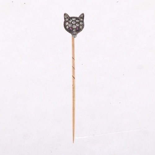 1151 - An Antique ruby and diamond fox-head stickpin, circa 1900, pave set with round cabochon ruby eyes an... 