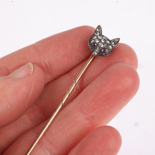 1151 - An Antique ruby and diamond fox-head stickpin, circa 1900, pave set with round cabochon ruby eyes an... 