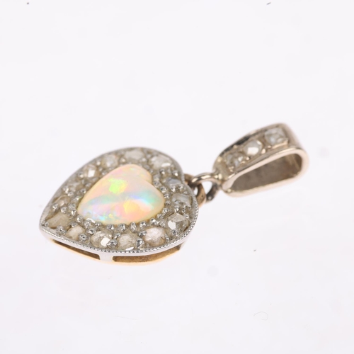 1156 - An early 20th century opal and diamond heart cluster drop pendant, circa 1910, centrally set with he... 