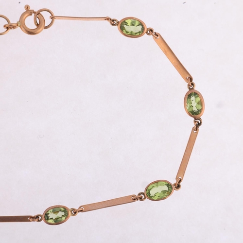 1167 - A 9ct rose gold peridot tennis line bracelet, maker SA, London 2011, rub-over set with oval mixed-cu... 