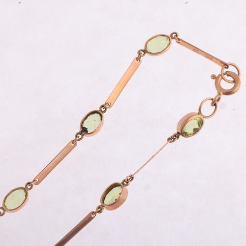 1167 - A 9ct rose gold peridot tennis line bracelet, maker SA, London 2011, rub-over set with oval mixed-cu... 