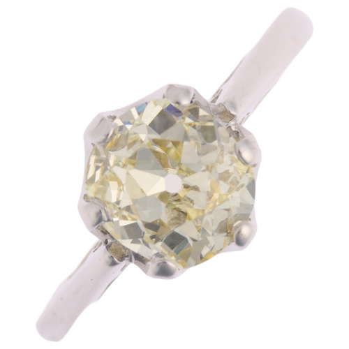 1172 - An 18ct white gold 1.9ct solitaire diamond ring, claw set with 1.9ct light yellow old-cut diamond, c... 