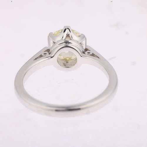 1172 - An 18ct white gold 1.9ct solitaire diamond ring, claw set with 1.9ct light yellow old-cut diamond, c... 