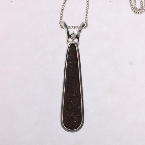 1178 - An 18ct white gold Australian boulder opal and diamond pendant necklace, by Leisha Wheeler, the elon... 