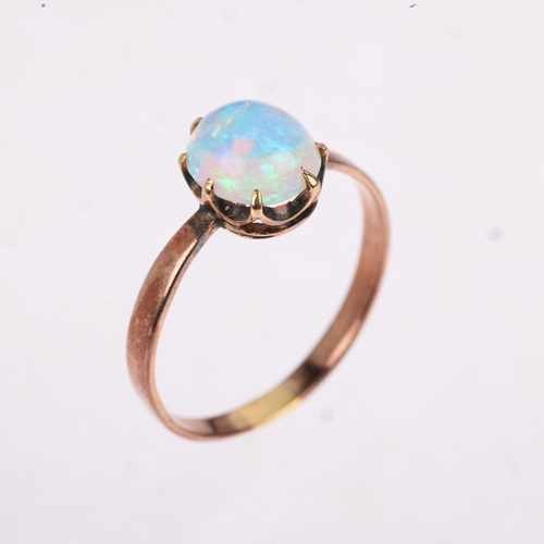 1179 - An early 20th century solitaire opal ring, claw set with 1ct oval cabochon opal, opal measures appro... 