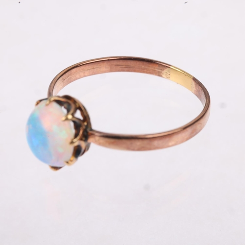 1179 - An early 20th century solitaire opal ring, claw set with 1ct oval cabochon opal, opal measures appro... 