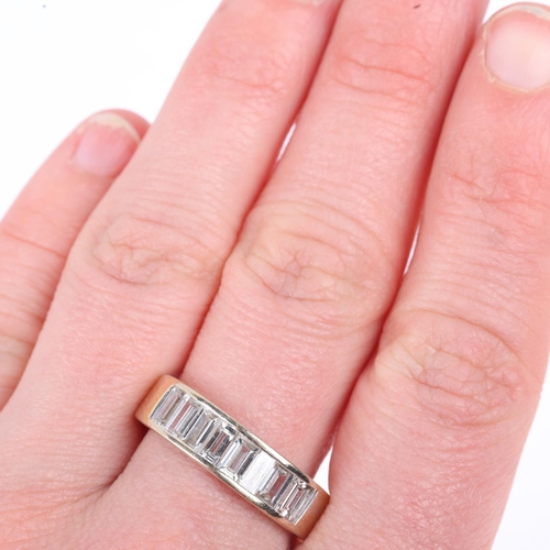 1188 - An 18ct white gold eight stone diamond half eternity ring, channel set with baguette-cut diamonds, t... 