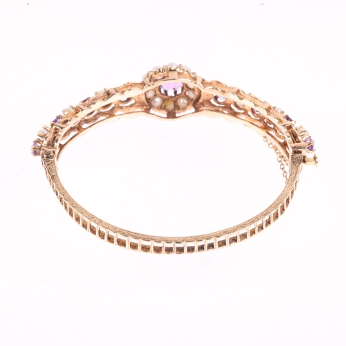 1194 - A late 20th century 9ct gold amethyst and pearl cluster hinged bangle, no maker's mark of date lette... 