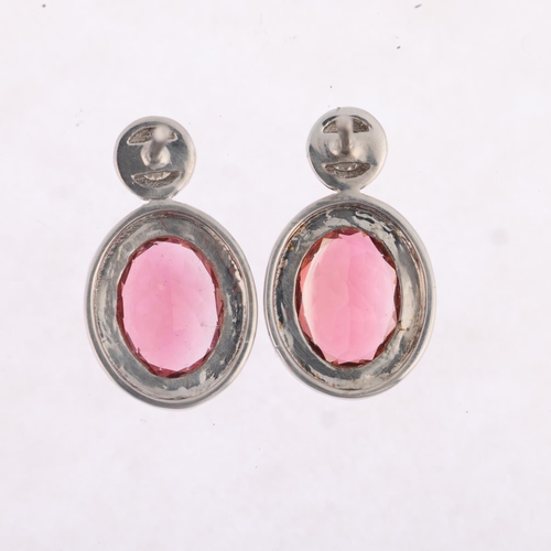 1199 - A pair of 18ct white gold pink tourmaline and diamond earrings, maker M&A, London 2018, rub-over set... 