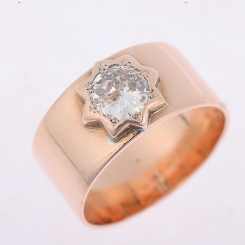 1200 - A large 9ct rose gold 1ct solitaire diamond band ring, star set with modern round brilliant-cut diam... 