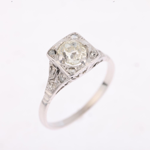 1203 - An Art Deco 0.65ct solitaire diamond panel ring, claw set with old-cut diamond surrounded by rose an... 