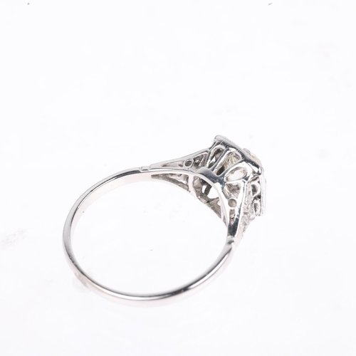 1203 - An Art Deco 0.65ct solitaire diamond panel ring, claw set with old-cut diamond surrounded by rose an... 