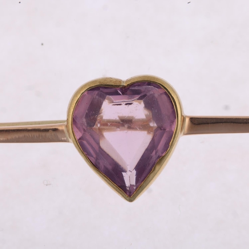 1221 - An early 20th century 9ct rose gold amethyst heart bar brooch, 60.3mm, 5.3g