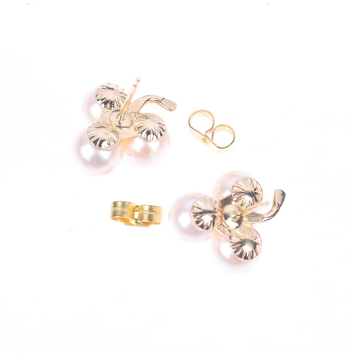 1223 - A pair of 14ct gold whole pearl and diamond clover earrings, with stud fittings, 15.2mm, 3.8g