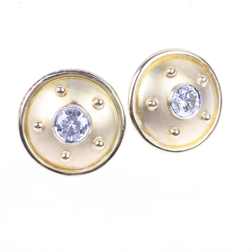 1225 - A pair of 18ct gold 0.8ct solitaire diamond bombe earrings, each rub-over set with 0.4ct modern roun... 