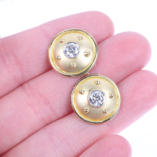 1225 - A pair of 18ct gold 0.8ct solitaire diamond bombe earrings, each rub-over set with 0.4ct modern roun... 