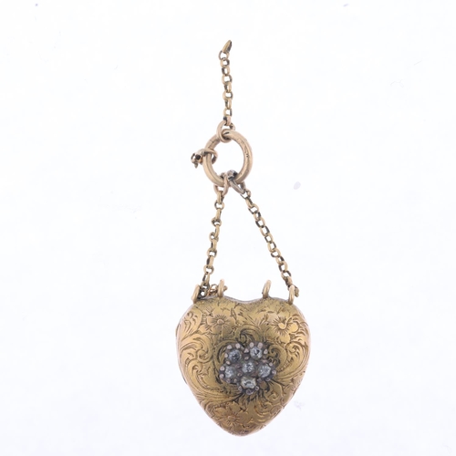 1237 - A Georgian Regency diamond heart locket pendant, central applied diamond flowerhead with allover eng... 