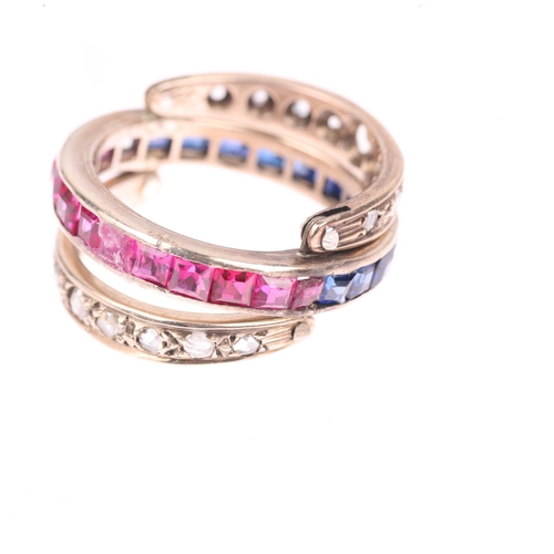 1238 - An Art Deco 'Day and Night' swivel eternity ring, half of the central band channel set with calibre-... 