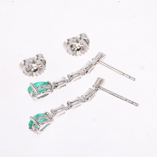 1241 - A pair of 18ct white gold emerald and diamond drop earrings, set with pear-cut emerald and baguette-... 