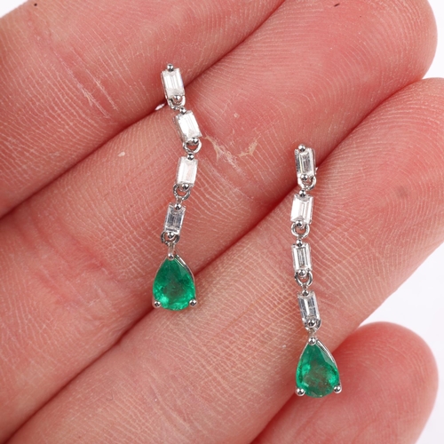 1241 - A pair of 18ct white gold emerald and diamond drop earrings, set with pear-cut emerald and baguette-... 