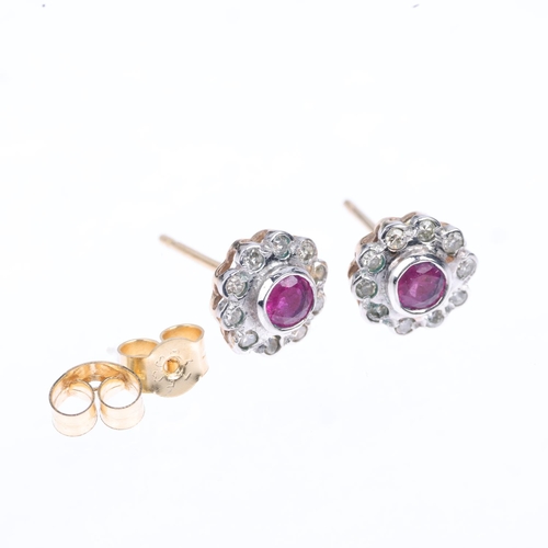 1242 - A pair of ruby and diamond flowerhead cluster earrings, with stud fittings, apparently unmarked, 8.1... 