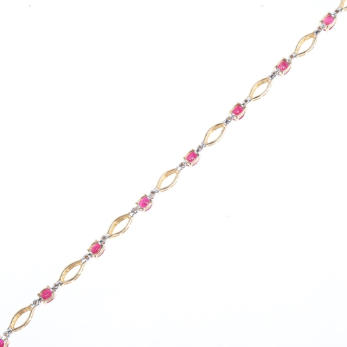 1243 - A 9ct gold ruby and diamond line bracelet, 18cm, 8.1g