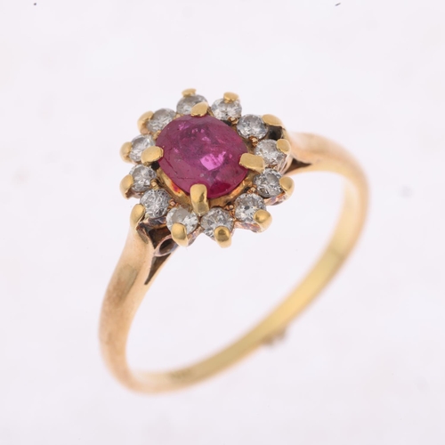 1245 - An 18ct gold ruby and diamond flowerhead cluster ring, claw set with oval mixed-cut ruby and modern ... 