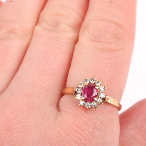 1245 - An 18ct gold ruby and diamond flowerhead cluster ring, claw set with oval mixed-cut ruby and modern ... 