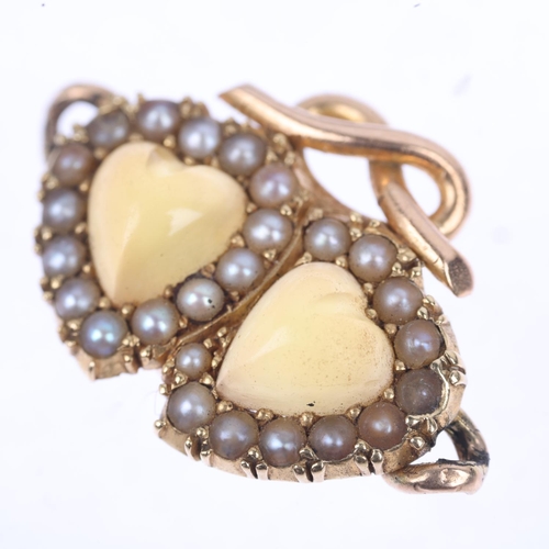 1246 - A Victorian chrysoberyl and pearl twin-heart pendant, circa 1890, each set with heart cabochon chrys... 