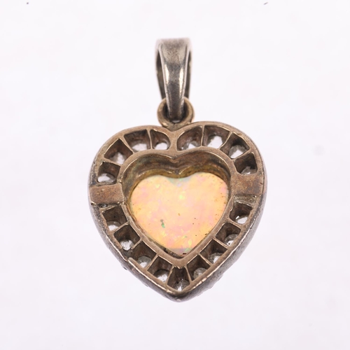 1250 - An Antique opal and diamond heart cluster pendant, set with heart cabochon opal, surrounded by rose-... 